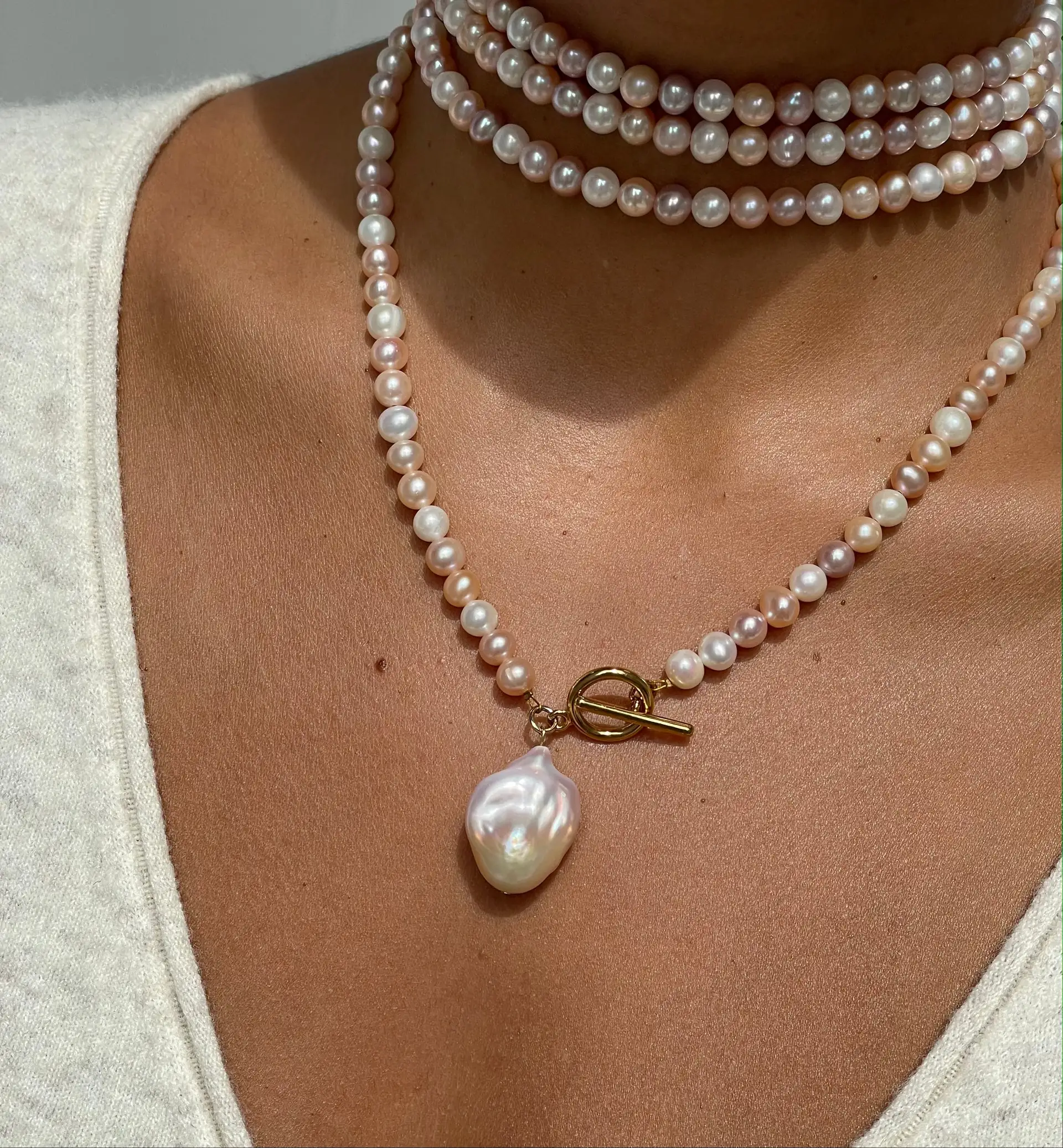 A Beautiful Pearl Charm That Can Be Worn As A Necklace Too