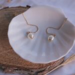 Pearls like the necklace here are vulnerable to scratches, chemicals, and environmental damage.